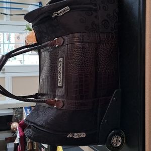 Beautiful Brighton Rolling travel carry-on bag. Braided Handles,